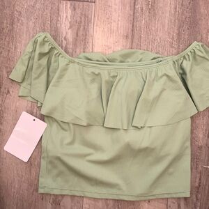 Kortni Jeane ruffled around swim top